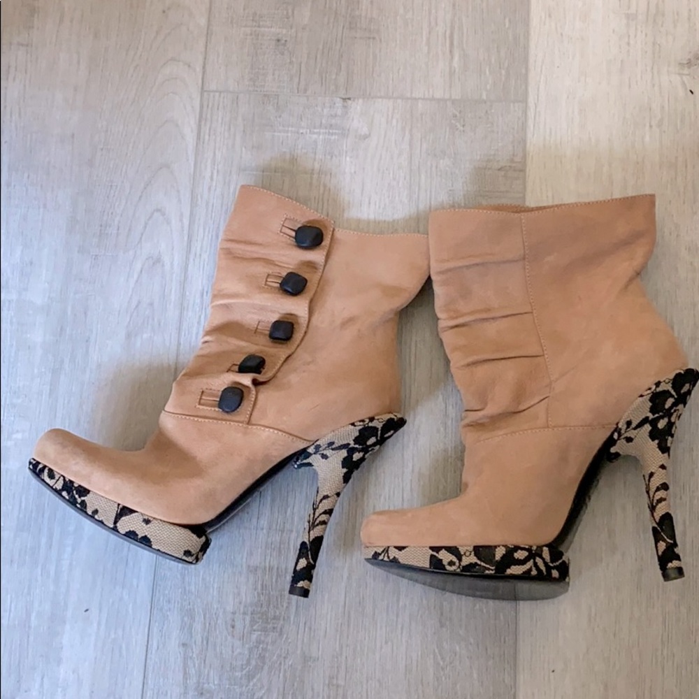 Q by Pasquale Heeled Boots